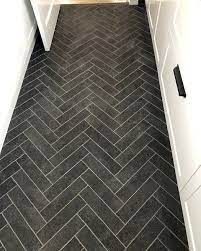 The grout actually winds up being reflected through the side of the glass, which is why darker grout looks more like a shadow and less like a definite line. Tilecloud On Instagram Our Chippendale Subway Tile In Black Perfect For Any Mud Room With Light Black Floor Tiles Powder Room Tile Herringbone Tile Floors