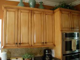 We have pickled oak (dated, flesh tone) cabinets in our kitchen, two bathrooms and laundry room. Glazed Cabinets Glazed Kitchen Cabinets Cabinet Oak Cabinets
