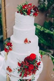 90% of wedding cakes we make have flowers on them. Beautiful Tiered Wedding Cake With Fresh Flowers Stock Photo Picture And Royalty Free Image Image 100439685
