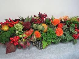 Veggie Table Centerpiece Using Decorative Greens From The Fresh Produce Aisle Thanksgiving Floral Thanksgiving Floral Arrangements Fall Floral Arrangements