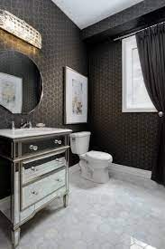 Delicate touches, such as the curvy mirror and brass sconces, feel perfectly at home. Create A Dramatic Powder Room In 5 Inspiring Steps