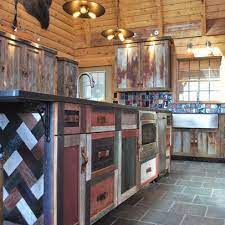 2 doors with diamond inlay pattern and wooden pulls. Barnwood Kitchen For Log Home Log Homes Rustic Kitchen Rustic Kitchen Cabinets