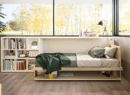 A small room containing a bed that converts to a sofa during the day. 13 Amazing Examples Of Beds Designed For Small Rooms