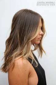 The top portion of the hair is longer and curly falling to the side, while the sides are shorter. Pin By Latest Hairstyles On Hair Blonde Highlights Hair Styles Front Hair Styles