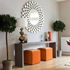 How To Decorate With Pouf Ottomans Right Now Wayfair Modern Dining Room Modern Console Tables Console Table Decorating
