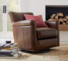Shop for swivel gliders at crate and barrel. Irving Roll Arm Leather Swivel Glider Pottery Barn