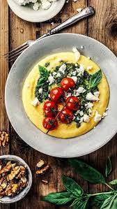 Creamy Polenta With Green Pesto Baked Tomatoes Feta Vegetarian Recipes Green Pesto Vegetarian Dishes