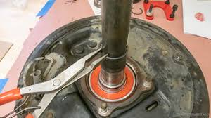 The rear axle is removed to access the defective rear axle seal. Replacing My Rear Axle Seals Bearings On A Toyota 4runner Also Tacoma Adventuretaco