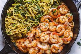 When the three ingredients combine to create an easy meal that is made in less than 30 minutes, your palate is happy.lemon garlic white wine shrimp fettuccine pasta is made with a few simple ingredients and a classic white wine pasta sauce. Lemon Garlic Butter Shrimp Recipe With Zucchini Noodles Recipe Shrimp Recipe Eatwell101