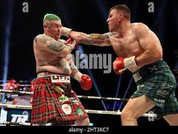 Jay McFarlane (left) and Nick Campbell in action during the Scottish  Heavyweight bout at the OVO Hydro, Glasgow. Picture date: Saturday February  26, 2022 Stock Photo