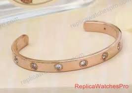 In the real vs fake cartier love bracelet image above, we have pointed out how the fake bracelet has its cartier text looking too small and too thin, which makes it appear being too little defined. Replica Cartier Love Bracelet With Diamonds Cartier Jewelry Replica