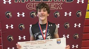 12 Charlotte-area wrestlers win NCHSAA state titles