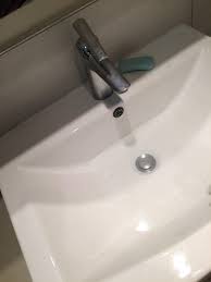 Feed the pivot rod into the stub and through the hole on the drain stopper. Sink Stopper Is Stuck And Water Does Not Go Through So Weird Happened Randomly When I Did Nothing To The Sink How Do I Fix This Plumbing