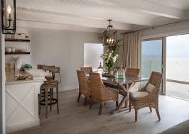Arched doorways, large columns, ornamental ceiling beams and ironwork. California Beach Cottage Coastal Dining Room Los Angeles By Maraya Interior Design Houzz