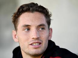 Jake jarmel is now a soccer coach, he took off his Malaysian glasses for  the photo