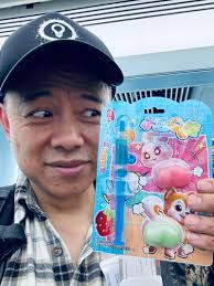 Convenience Store near Gate D9, Beijing Capital Airport. Saw a mob of kids  wrestling over (yes, really) a pack containing two candy butts you jab with  a syringe of flavoured gel. Some