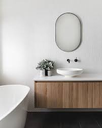 The best answer is to make your bathtub to pop out. These Penny Tile Bathroom Backsplash Ideas Pack A Big Punch Bathroominspiration Penny Tile Bathroom Backsplash Penny Tiles Bathroom Washroom Design Penny Tile