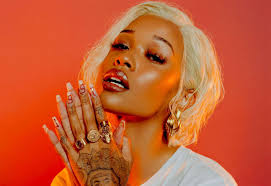 We love how it balances out dark brown and black hair hues yet still flatters lips. Wallpaper Women Model Blonde Straight Hair Open Mouth Looking At Viewer Red Lipstick Eyelashes Makeup Dyed Hair Earring Jewelry Rings Long Nails Painted Nails Tattoo White Clothing Simple Background Red Background