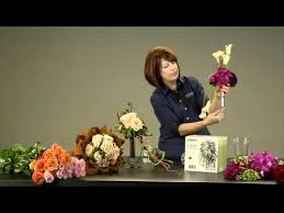 How to make hand tied bridal bouquets using calla lillies. Using Bouquet Holders For Hand Tied Bouquets Floral Products Flower Crown Wedding Diy Calla Lily Bouquet Wedding Bouquet Holder