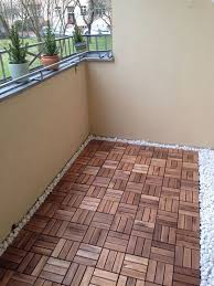 Outdoor interlocking slat polypropylene patio and deck tile flooring in dark gray (set of 6) Runnen Decks For Outdoor Floor Decoration Balcony Decoration Eco Friendly Garden Ideas