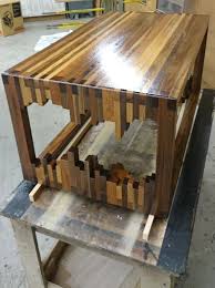 This Diy Er Creates A Unique Coffee Table By Stacking Wood Wood Strips Wood Diy Crate Coffee Table