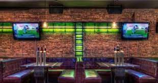 Pigskin And Prada The Best Bars For The Fashion Set On Superbowl Sunday Sport Bar Design Sports Bar Pub Design