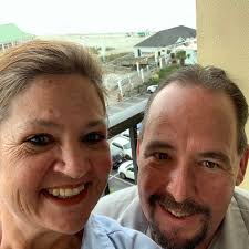 How many pounds of pork shoulder are needed for 75 people?