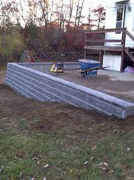 Retaining Wall Along Driveway Retaining Wall Patios Outdoor Decor