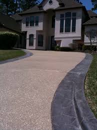 Gray concrete driveways don't have to look boring and ordinary. Concrete Resurfacing Repair Houston The Woodlands Magnolia Tx All Concrete Coatings