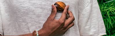 Like most charm crystals, this amulet is said to hold certain properties to empower one's self. Tiger S Eye Meaning Healing Properties Energy Muse