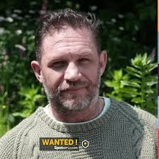 The olive green sweater worn by Tom Hardy