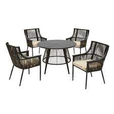 I love the black and white contrast of colors, and the smoky tempered glass top is gorgeous. Hampton Bay Bayhurst 5 Piece Black Wicker Outdoor Patio Dining Set With Cushionguard Toffee Trellis Tan Cushions Yahoo Shopping