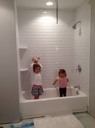 We Have A Shower White Beveled Subway Tile Beveled Subway Tile Bathroom Shower Remodel Subway Tiles Bathroom
