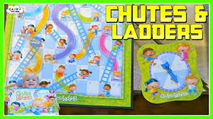 Game board, plastic spinner, 4 pawns and their plastic stands. Chutes Ladders Classic Board Game Review For Kids Youtube