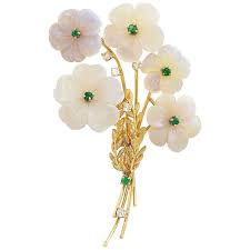 Maybe you would like to learn more about one of these? 18 Karat Gold Five Carved Opal Emerald And Diamond Flower Brooch At 1stdibs