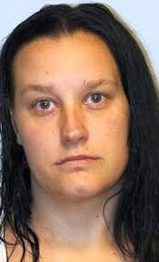 Police say they've arrested woman who drove suspect to store robberies