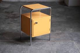 Wayfair has metal nightstands in a variety of shades and styles, from simple rectangular tables to exquisite etched tables that are a complete statement piece. Nightstand In Bauhaus Style Tubular Steel Nightstand In Apricot Zeitflair