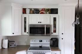 The standard placement for upper cabinets has long been 18 inches above the counter. How To Build Open Shelving Above Cabinets For Custom Look