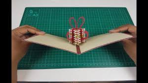For portrait style a2 card, cut the two pop up pieces for inside at 4 1/4 by 4 and score at 1, 2 and 3 on short side. How To Make A Pop Up Card Christmas Present Card 3d Sliceform Tutorial Youtube