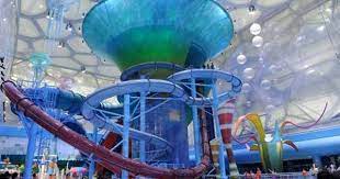 Grab Your Tube And Check Out The Best Slides Rides And Pools For A Whole Day Of Family Fun Water Park Indoor Waterpark Fun Places To Go