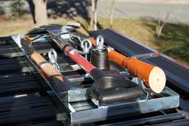 I also use the remaining space to mount items that take up too much space inside or that get frequently dirty or muddy (traction boards, shovel, ax, saw, etc). Rhino Rack Axe And Shovel Mount Offroad Designs