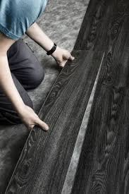 The black neoprene strip placed between the boards adds a. Black Vinyl Planks Black Vinyl Flooring Restaurant Flooring Grey Wood Floors Living Room