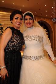 احتفلت الفنانة المصرية شيماء سيف بعقد قرانها على المنتج محمد كارتر، مساء الجمعة بمسجد الشرطة بمدينة السادس من أكتوبر. Ø­ÙÙ„ Ø²ÙØ§Ù Ø´Ù‚ÙŠÙ‚Ø© Ø§Ù„ÙÙ†Ø§Ù†Ø© Ø±ÙˆØ¬ÙŠÙ†Ø§ Ø£Ø®Ø±Ù‰ 2014 ØµÙˆØ± ÙÙŠØ¯ÙŠÙˆÙ‡Ø§Øª Ø£Ø®Ø¨Ø§Ø±