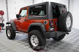 Image result for Flame Red 2009 Jeep