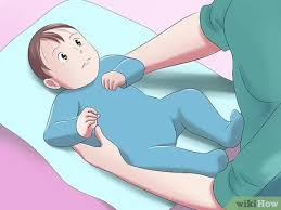 When you're done bathing him, quickly wrap him up in the towel so he doesn't lose too much body heat. How To Give Your Baby A Bath When Traveling With Pictures