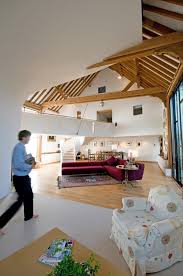 In this barn conversion by lapd architects, the roof trusses were adapted to create first floor accommodation. Barn Turned Into A Contemporary Home In Surrey England