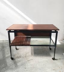 4.5 out of 5 stars 2. Mid Century Black Iron Coffee Table With Clear Glass And Wooden Shelves For Sale At Pamono