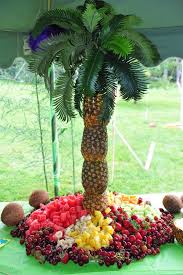 These trees are made using the technique of grafting and not genetic modification. Luau Centerpiece Fresh Fruit And A Pineapple Palm Tree Fruit Display Pineapple Palm Tree Luau Fruit Display