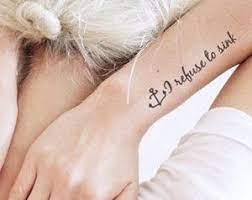 Top 30 Inspiring Strength Tattoos Girlterestmag Inspiration Tattoo Cute Small Quotes Strength Tattoo Meaningful Tattoos For Women Tattoo Quotes For Women