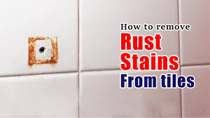 Dab the stain with a soft cloth dipped in hydrogen peroxide or diluted bleach. How To Remove Rust Stains From Tiles Youtube